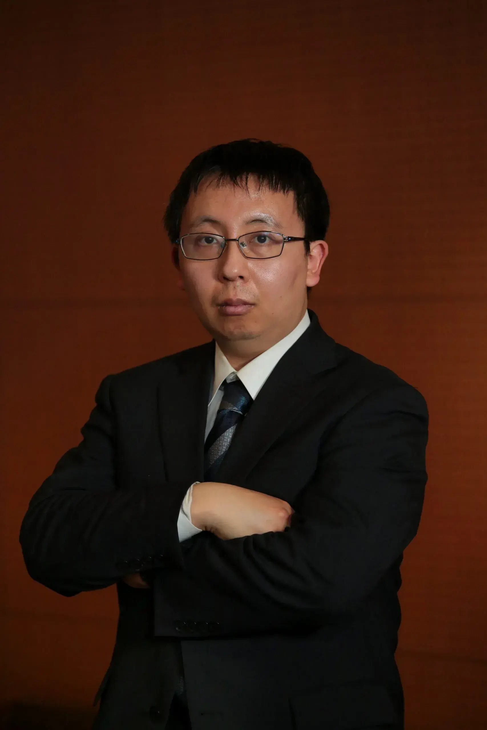 専修大学経済学部専任教員 小川健